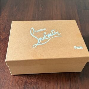 Christian Louboutin So Kate pumps in patent nude